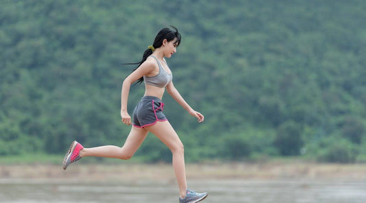 woman running moisturizing way to pain relief dual benefits of menthol-free CBD pain cream