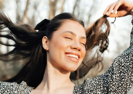 happy woman Mindful Living: Incorporating Anxiety Relief Gummies into Your Wellness Routine